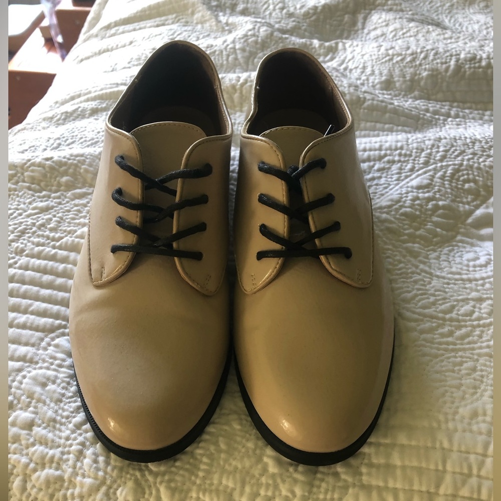 Also patent leather lace up shoes
